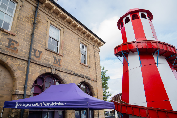 red and whire striped helter-skelter infront of Market Hall Museum.