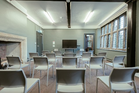 A learning room with a tv screen