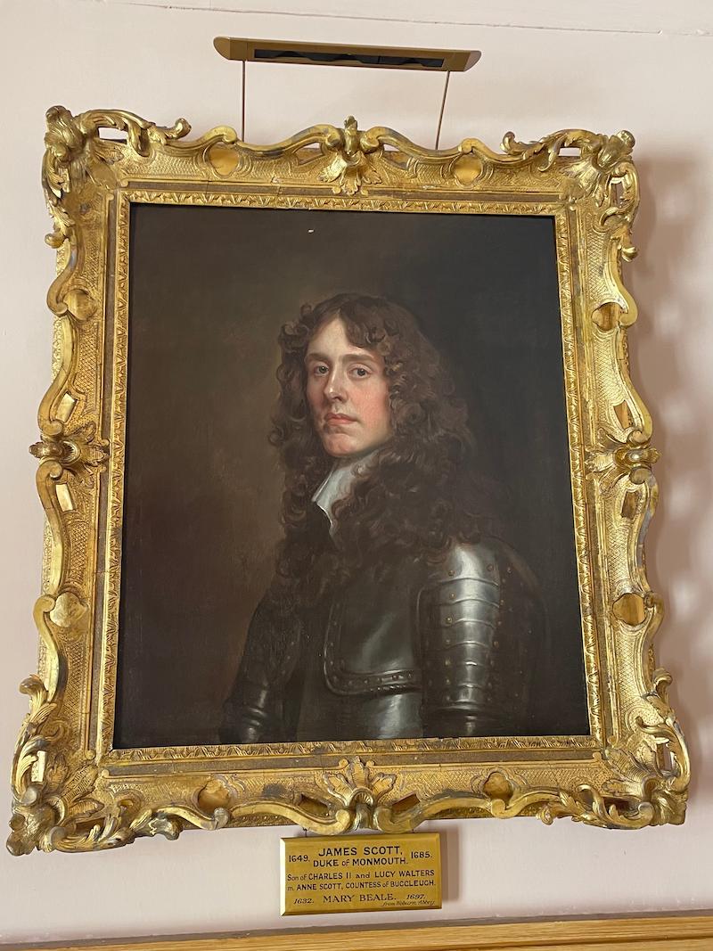 A painting of a man that is in shire hall