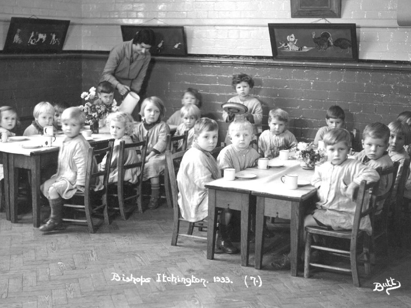 A photo of children in a classroom from 1933