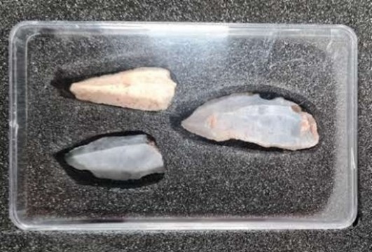 Three flint flakes and blades