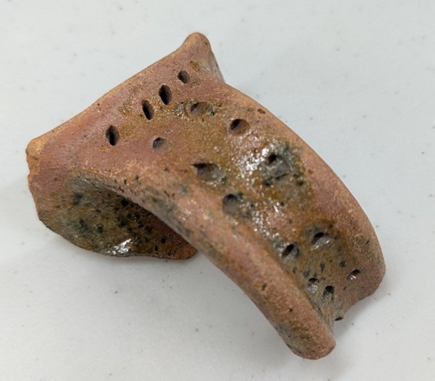 In the Medieval period, jugs like this would have had decorated handles and a green glaze.