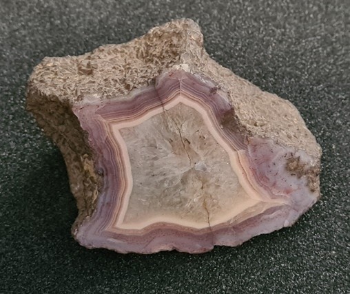 A cut and polished agate which is a semi-precious stone. This example is probably from South America and collected in the nineteenth century.
